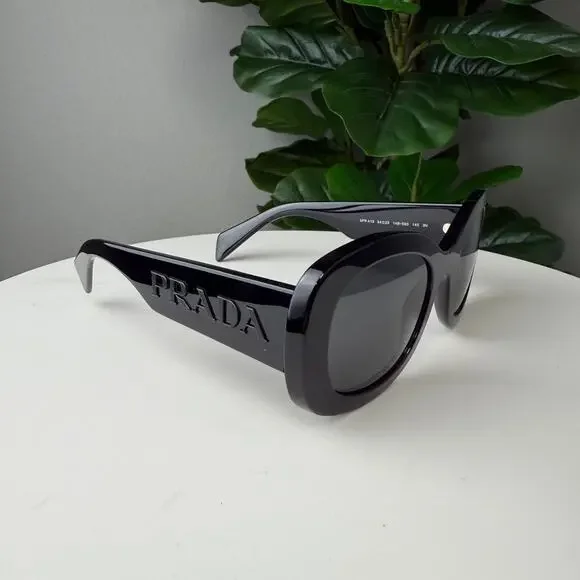 Prada | Accessories | Prada Black Oval Sunglasses | Poshmark display picture 2